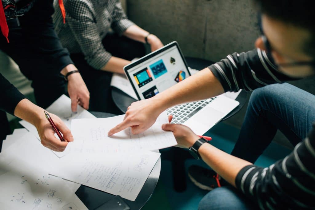 Team reviewing lead generation software