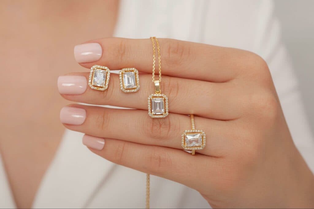 A woman holding diamond jewelry at a jewelry business