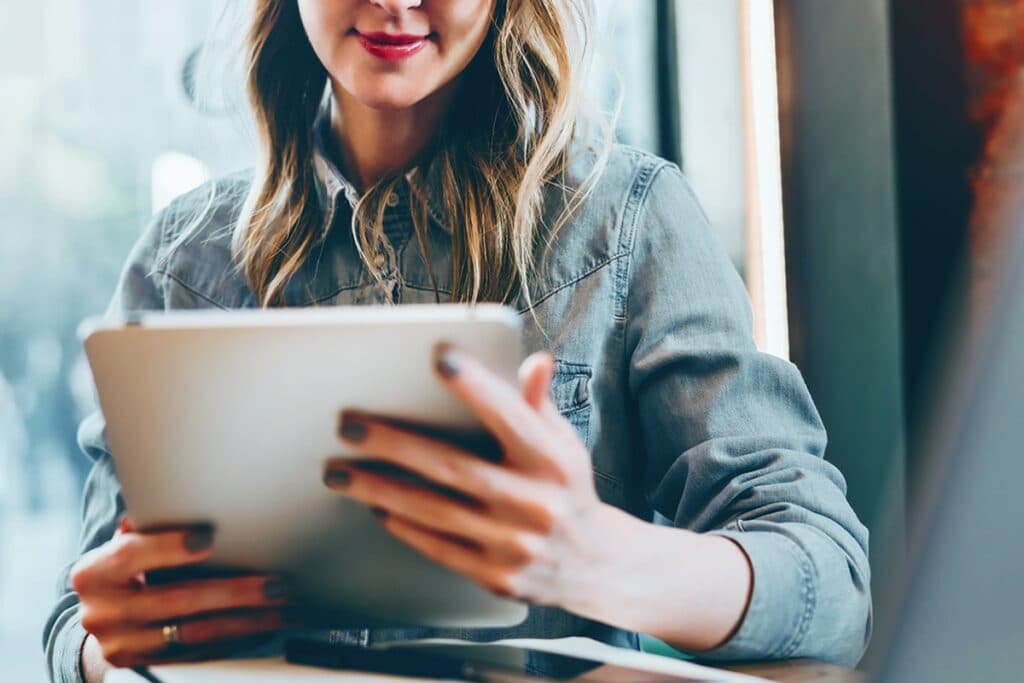 Person reviewing site strategy on a tablet