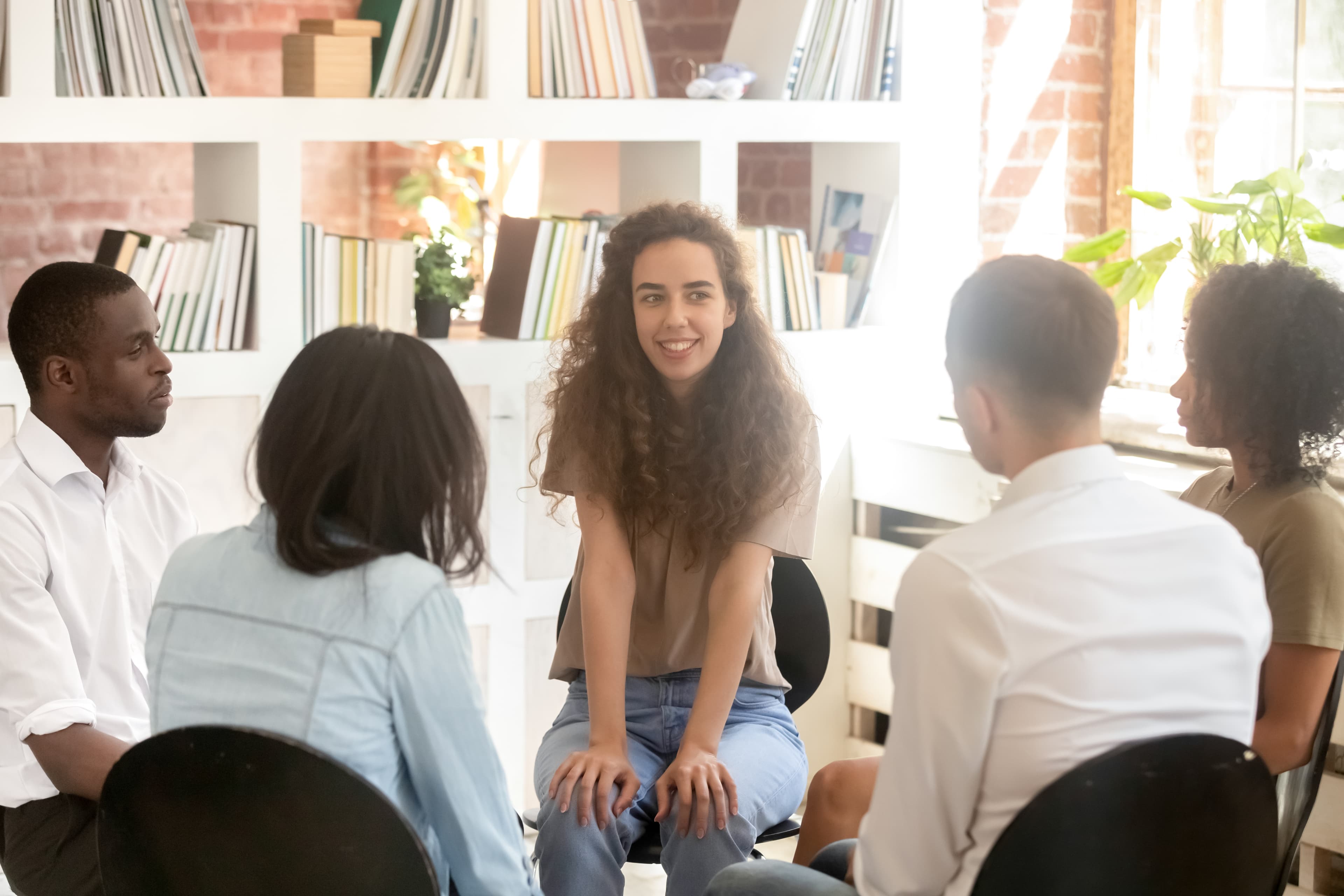 Woman in a group life coaching class