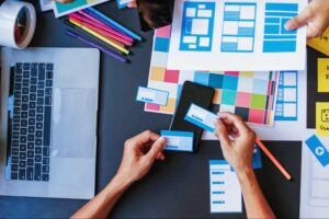 A designer compares colors and templates for a website