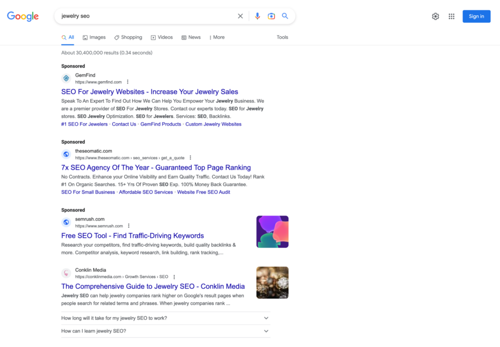 A screenshot of paid ads and organic search results for the keyword jewelry SEO.
